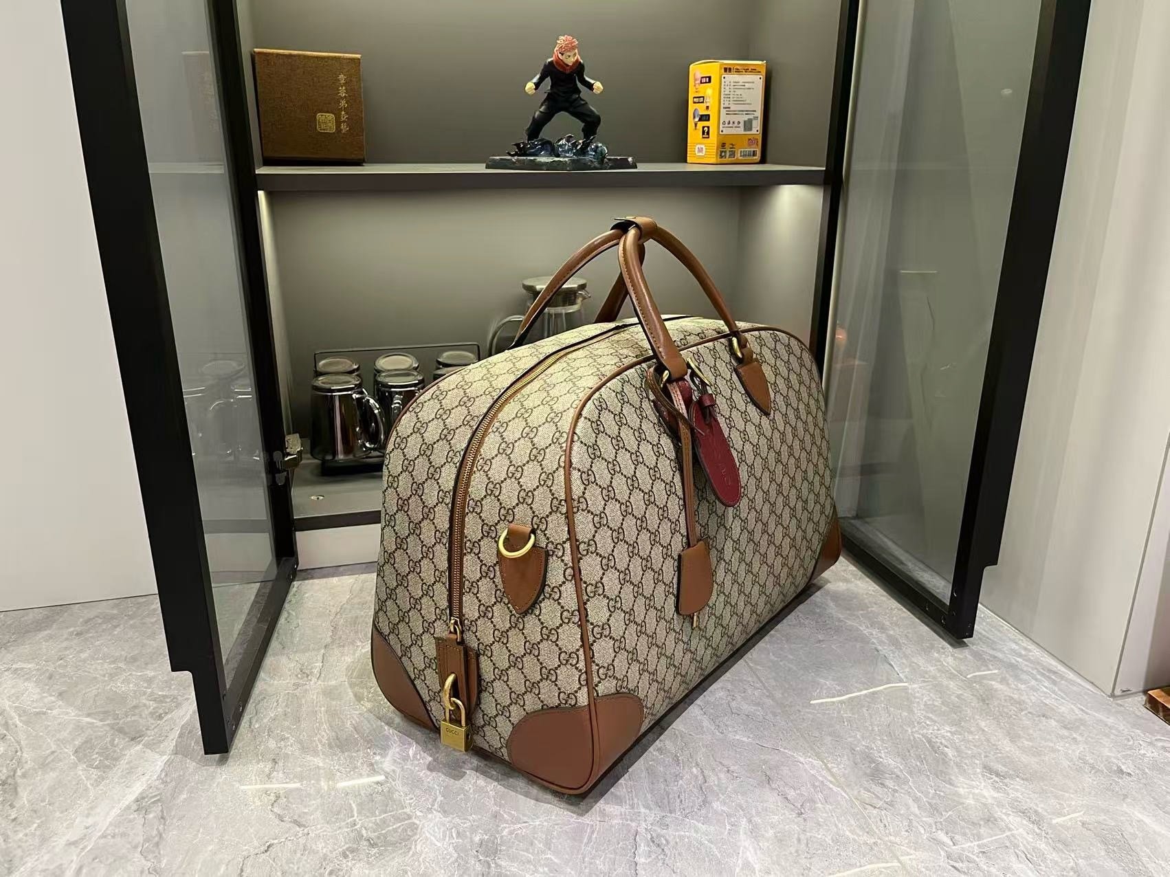 Gucci Canvas GG Emblem Brown Travel Bag 821148