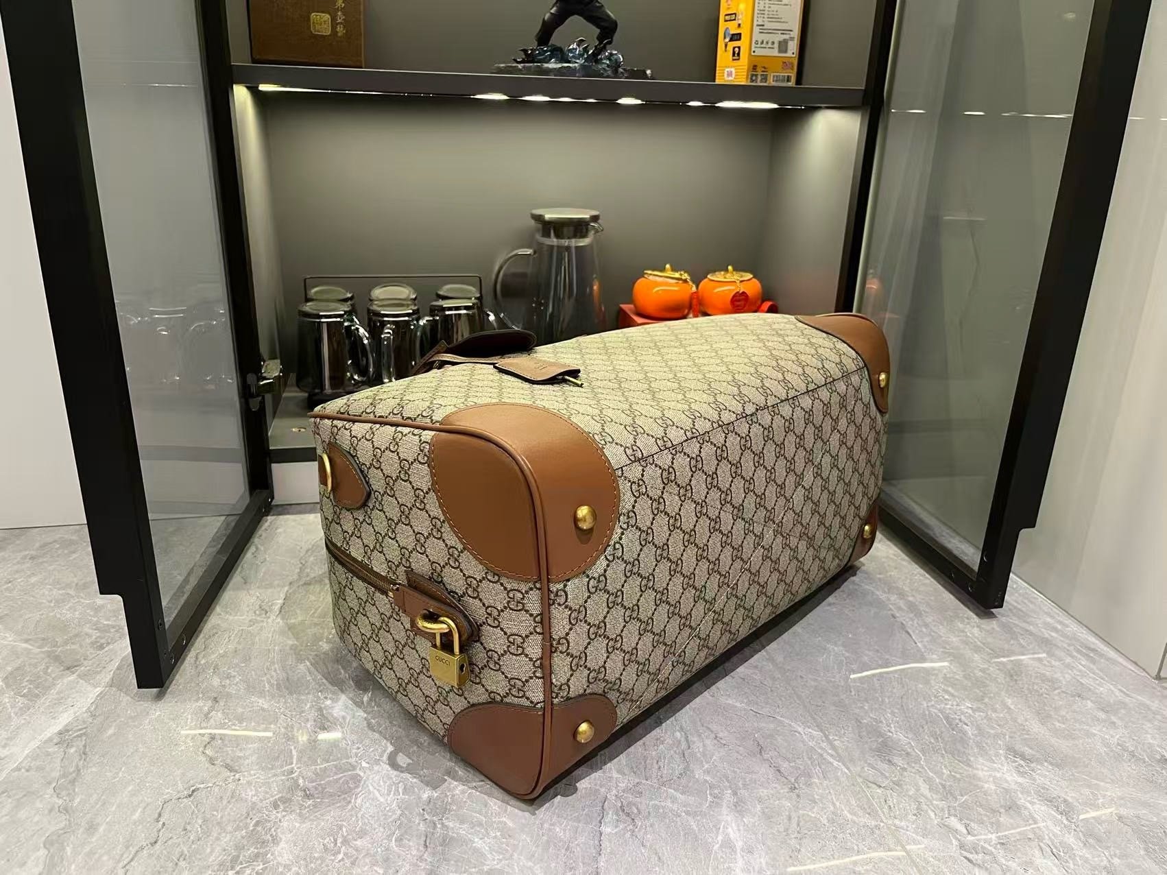 Gucci Canvas GG Emblem Brown Travel Bag 821148