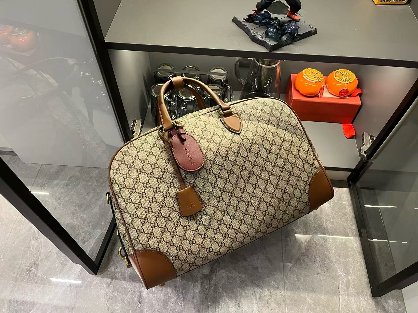 Gucci Canvas GG Emblem Brown Travel Bag 821148